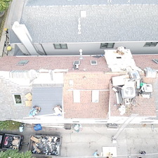 Why-Does-My-Low-Slope-Roof-Look-Fine-but-Still-Leak-Every-Time-It-Storms 1